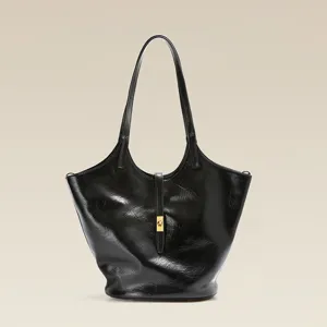 Black genuine leather tote bag for women, large capacity soft cowhide shoulder commuter bag.
