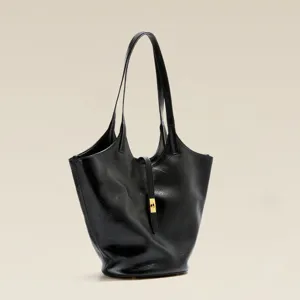 Black soft leather tote bag, large capacity cowhide shoulder bucket bag for women daily commute.