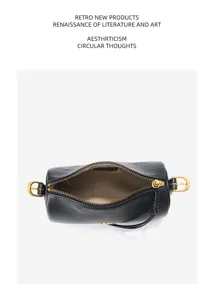 Black top-layer cowhide cylindrical shoulder bag, large capacity daily commuting pillow baguette bag.