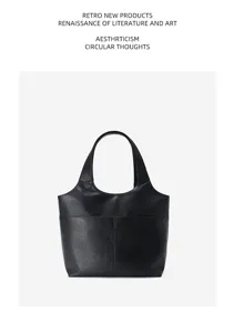 Classic black genuine leather tote bag for women, large capacity daily commuter shoulder bag.