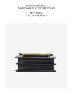 Classic black leather shoulder bag with metallic clasp closure, elegant commuter purse.