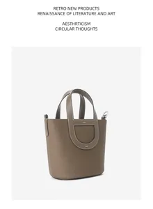 Togo leather bucket handbag for women, casual top handle shoulder bag with stylish design details.