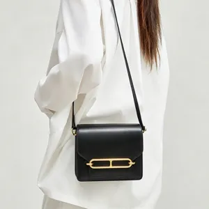 Glossy leather crossbody shoulder bag for women, elegant daily commuting square handbag.