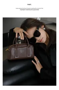 Detail shot of the vintage genuine leather Boston bag, elegant handbag for daily commute use.