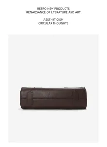 Detailed bottom view of genuine leather retro boston bag showing fine stitching and quality.