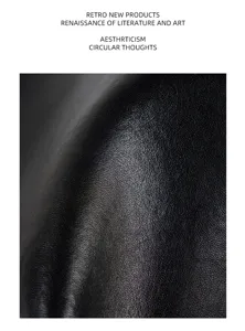 Detailed close-up view of premium black genuine cowhide leather texture for luxury tote bag.