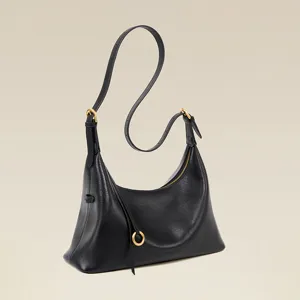 Black genuine leather shoulder hobo bag minimalist luxury commuter underarm bag with gold hardware.