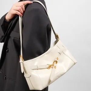 Elegant white leather underarm shoulder bag for women, chic commuting hobo bag with metal hook.