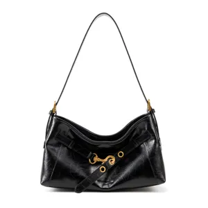 Black crinkled leather shoulder bag underarm hobo bag with chic metal hardware and buckle design.
