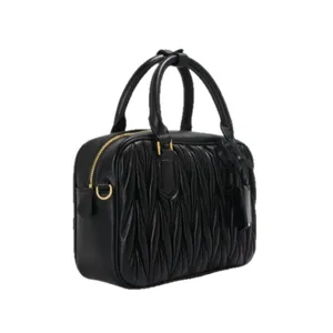 Stylish black leather ruched mini bowling bag for women, trendy boston top handle handbag.
