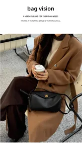 Detailed view of the black genuine leather shoulder bag, showcasing premium texture and chic design.