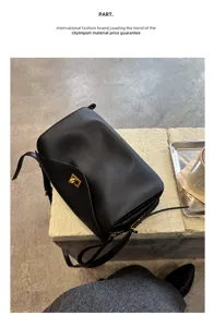 Black genuine leather shoulder bag for women, large capacity Boston commuting crossbody bag.