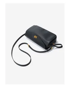 Black leather boston pillow bag detail with soft cowhide material and elegant gold lock hardware.
