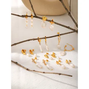 Detailed close-up view of assorted irregular baroque pearl and gold plated earrings set.