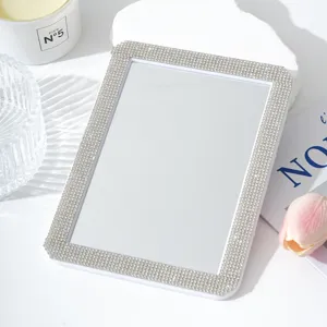 Rhinestone desktop makeup mirror detail shot, portable cosmetic vanity mirror for dorm room.