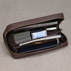 Close-up detail of vintage genuine leather long wallet interior with multi-slot capacity.