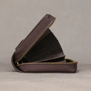 Men's brown genuine leather accordion card holder wallet with secure metal zipper closure.