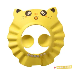 Vue détaillée du bonnet de douche bébé jaune avec protection aurigulaire et boutons pression.