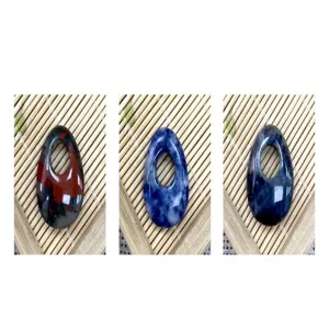 Close-up details of natural stone off-center hole oval pendant DIY crystal accessories.