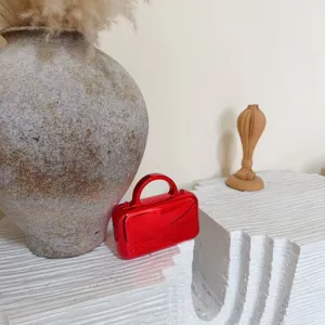 Red metallic hardcase evening clutch bag with top handle for women fashion stylish accessory