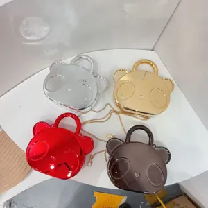 Cute glossy bear kids handbag and crossbody bag with metal chain, stylish metallic finish.