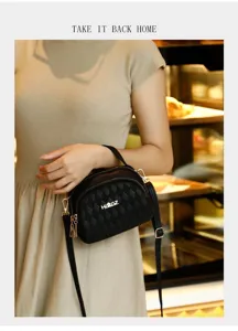 Trendy black quilted crossbody bag with multi-layer zipper design for women commute.