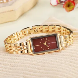 Orologio donna rettangolare dorato con quadrante rosso e cinturino in metallo.