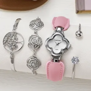 Gros plan detaille montre cuir rose femme et ensemble bracelet cristal style chic.