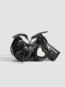 Black crocodile embossed crescent shoulder bag with heart mirror and chic metal rivet details.