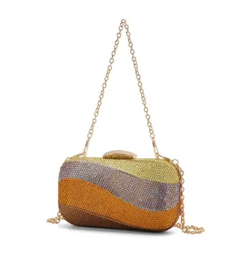Elegant rhinestone evening clutch bag with golden chain strap and chic wavy colorful design.