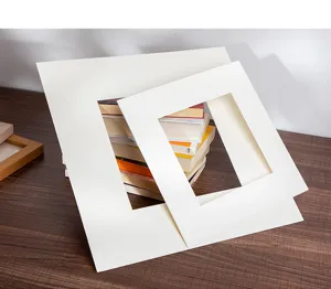 White picture mat board detail scene showing rectangular core mount aperture for framing artwork.