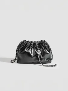 Womens black crinkled cloud crossbody bag with metal chain strap and chic adjustable ball.