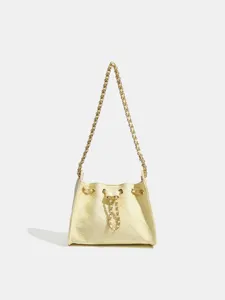 Vintage gesteppte Kette Kordelzug Eimer Tasche, stilvolle gelbe Umhängetasche Damen.