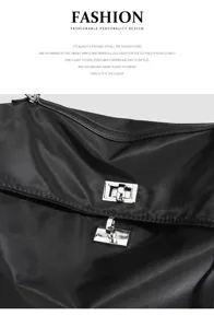 Black nylon waterproof shoulder bag with metallic turn-lock closure large capacity tote.