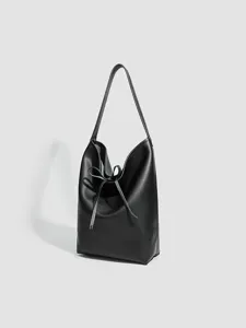 Bolso tipo cubo negro minimalista para mujer, bolso de hombro suave con cordón ajustable.