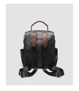 Dames vintage Britse stijl rugzak voor studenten, minimalistische mode reis zwarte tas detail.