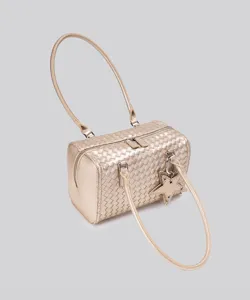 Gold woven leather shoulder bag with star charm, stylish barrel handbag for women daily.