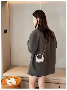Chic silver metallic crossbody mini bag for women, trendy niche design with chain strap.