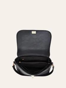 Detailed view of the black textured leather crossbody bag with multiple interior compartments.