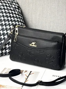 Stylish black embossed women crossbody shoulder bag with multi layer zipper and chic clover design.