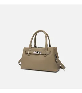 Taupe pebble-grain leather Kelly handbag featuring top handles and detachable shoulder strap.