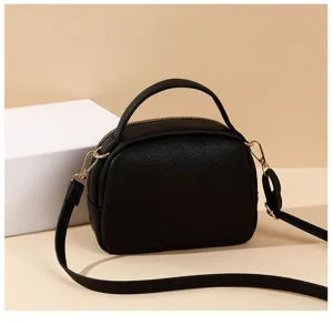 Minimalist black handbag for women, chic top handle crossbody bag with multiple compartments.