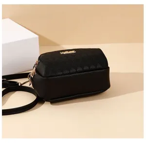 Detailed view of the black quilted crossbody bag, highlighting the premium leather texture.