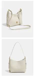 Beige hobo schoudertas detail, minimalistisch design met chique gouden hardware.