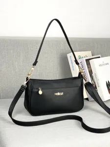 Black multi-layer leather shoulder bag, casual crossbody hobo bag for women daily use.