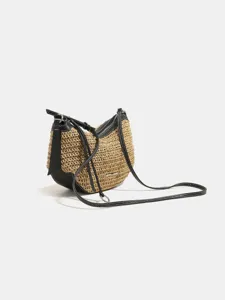 French woven straw shoulder bag summer beach hobo crossbody handbag with black leather trim.