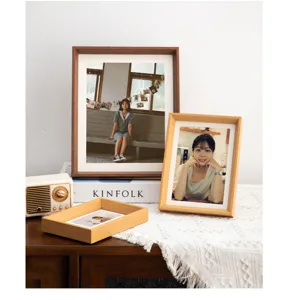Wooden photo frame detail display, natural wood grain desktop picture frame for home decor.