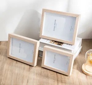 Wooden photo frame detail showcase on a wooden table, minimalist design for home decor and desk.