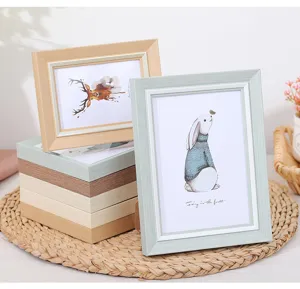 Modern minimalist wooden photo frame desktop display, fresh style picture frame for home decor.