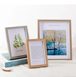 Minimalist wooden photo frame set for tabletop display, elegant home decor with art prints.